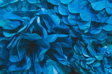 Old blue crumpled pieces in a pile of paper background