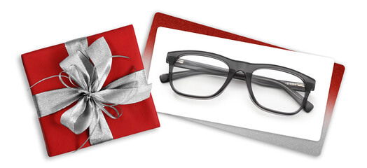 glasses christmas gift card, red box with glittering silver ribbon bow, white ticket and black...