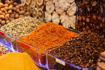 Assortment of spices in the Turkish market. Turmeric and pepper mix. coriander, paprika and chili