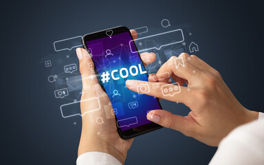 Hand using smartphone with social media concept concept