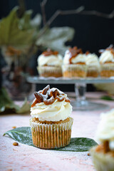 Maffin cake cupcake with white cream autumn green leaf