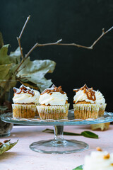 Maffin cake cupcake with white cream autumn green leaf