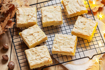 Apple pie slices with meringue served with coffee. Rustic style.
