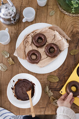 Homemade chocolate donuts. Healthy donuts with no added sugar. Donuts made with pumpkin, dates and...