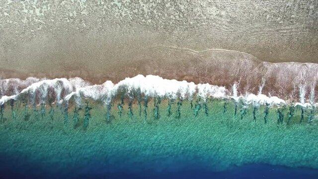 Drone aerial view Bora Bora Tahiti. Tropical paradise island, turquoise crystal clear water lagoon. French Polynesia. Exotic travel vacation getaway, romantic honeymoon destination