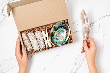 Smudge kit with white sage, palo santo, abalone sea shell. Natural elements for cleansing...