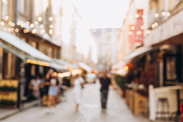 Blurred Defocused background of walking street with crowd people hang out and enjoy sunny day in...