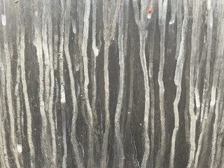 background drips of paint on iron grey