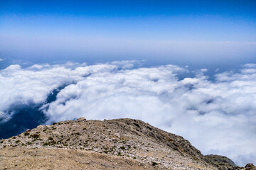 view from the top of the mountain in summer above the clouds. Turkey