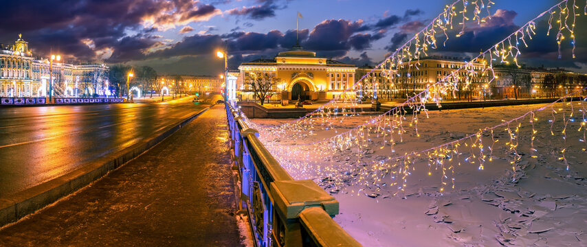 Saint Petersburg in winter. Christmas Russia. View of Admiralty from palace bridge. Saint Petersburg on Christmas night. Panorama of evening Petersburg. Frozen Neva. New Year in Russia