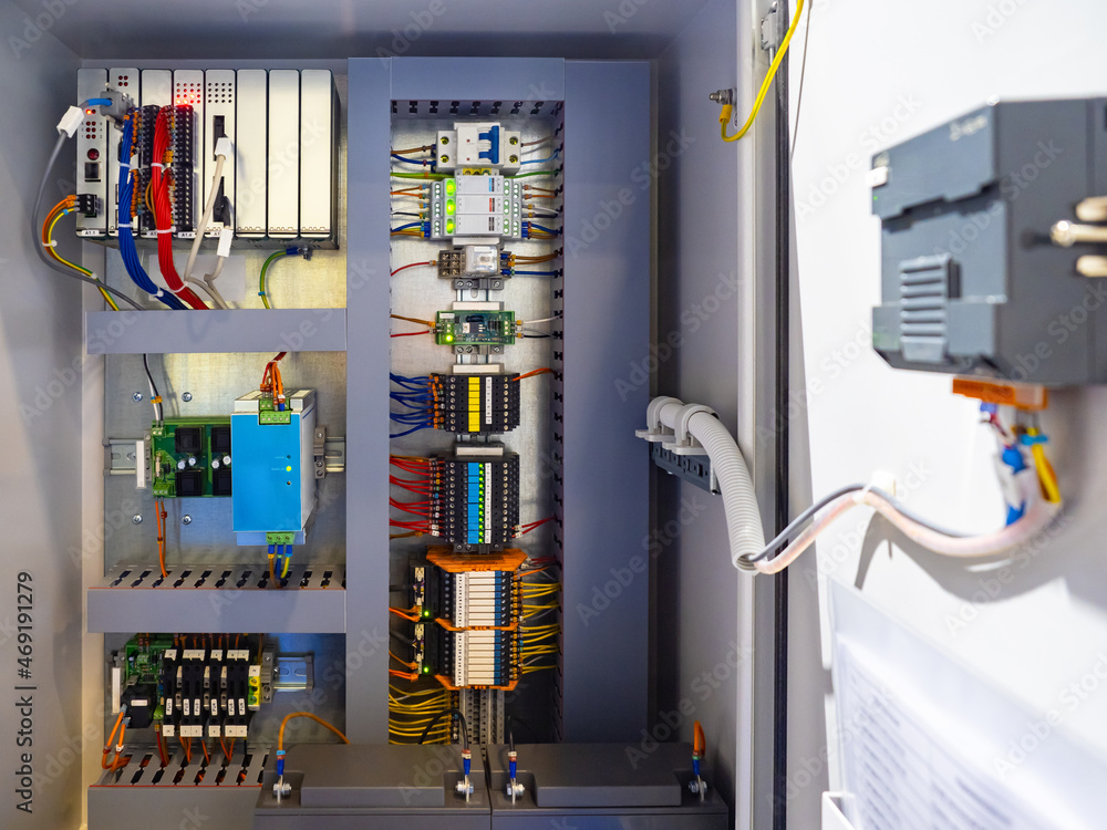 Poster electrical circuits. electrical wires by control panel. industrial electrical concept. plc wiring co