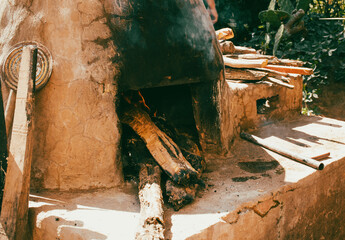 clay oven burning wood in rural Mexico