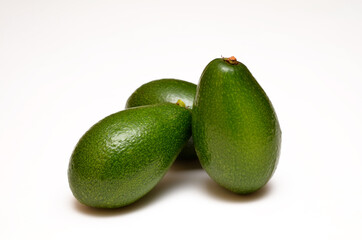whole avocado isolated on white background