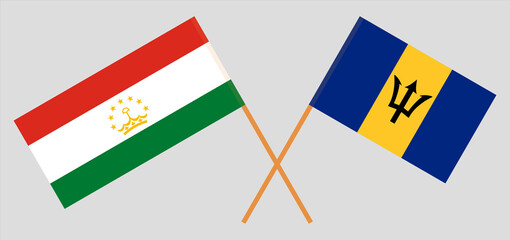 Crossed flags of Tajikistan and Barbados. Official colors. Correct proportion