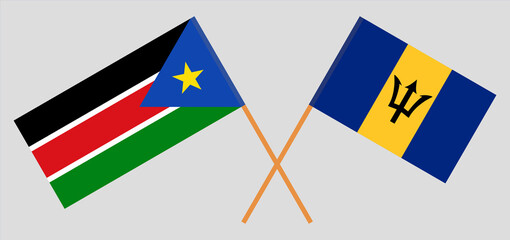 Crossed flags of South Sudan and Barbados. Official colors. Correct proportion