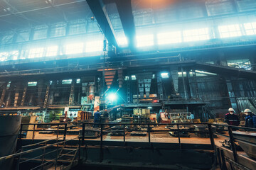 Foundry workshop interior. Typical metallurgical plant. Heavy industry background.