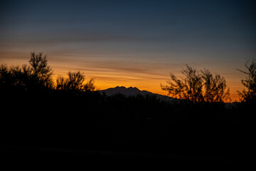 Fototapeta na wymiar Arizona Sunset; Four Peaks Sunset; Blue and Orange Desert