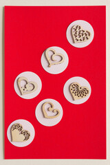 wooden heart shapes on paper circles