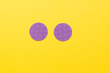 yellow paper background with purple circles