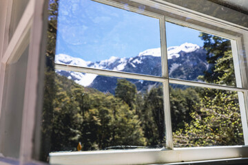 window view from cabin in the mountains
