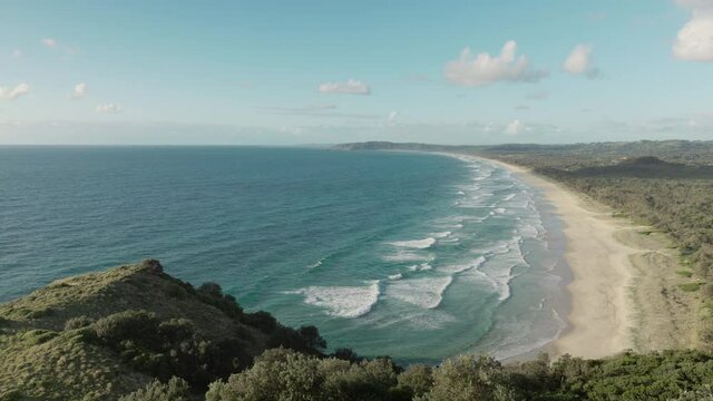 a high angle morning shot of tallows beach at byron bay in northern nsw, australia