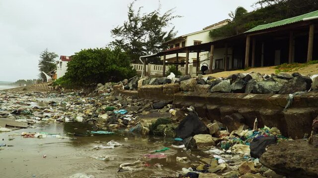 Mui Ne Bay after a huge typhon during october in south china sea. plastic rubbish in sea levels are rising. piles of plastic waste that can be found along the Da Loc beach, Thanh Hoa province, Vietnam