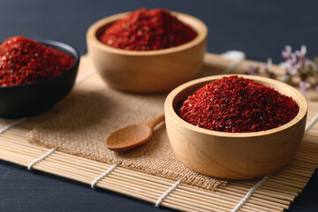 Obraz na płótnie Canvas Korean red chili powder in a bowl for cooking, Chili flakes