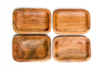 four wooden rectangular eco-friendly bowls