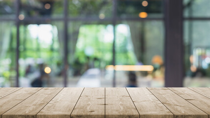 Empty wood table top and blurred coffee shop and restaurant interior background - can used for display or montage your products. - 469211050