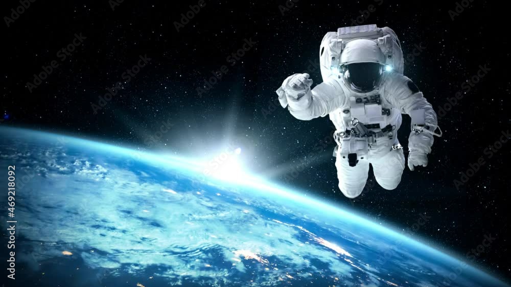 Wall mural astronaut spaceman do spacewalk while working for spaceflight mission at space station . astronaut w