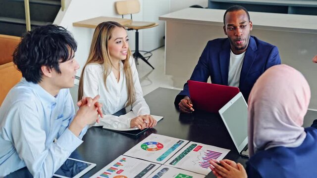 Group of multi racial people meeting in the office. Global business. Teamwork of business. Diversity.