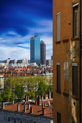 Fototapeta premium Buildings and downtown of Lyon in long exposure seen from Croix Rousse hill