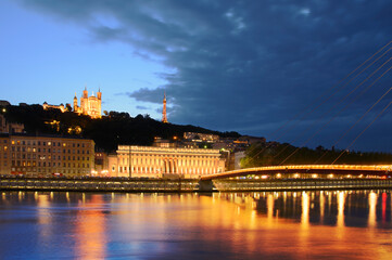 Courthouse and basilica at Lyon with citylights, France - obrazy, fototapety, plakaty
