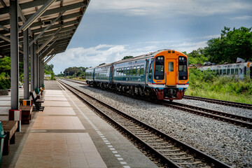 Ancient Thai train on the rails in the station