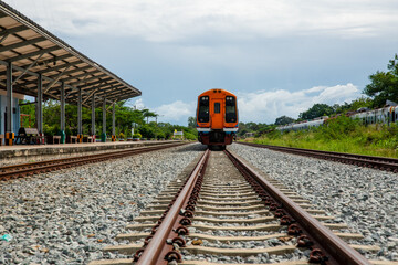Ancient Thai train on the rails in the station