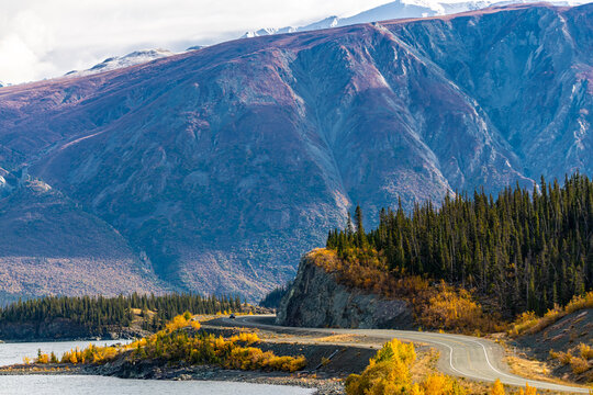 Road Trip, Tourism, Travel Themed Shot Heading Directly Towards Huge Mountain Landscape In Fall, Autumn During September In Northern Canada, Yukon Territory, Haines Junction. 