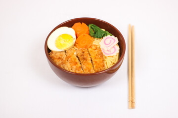 delicious ramen and a pair of chopsticks isolated on white background