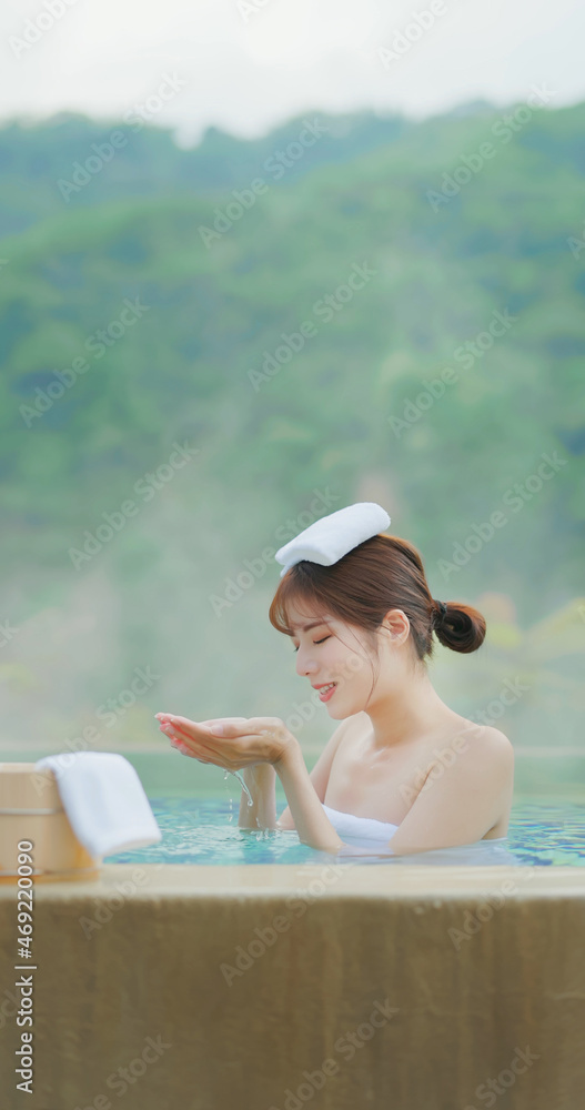 Poster woman scoop up hot spring