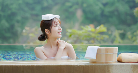 woman relax in hot spring - obrazy, fototapety, plakaty