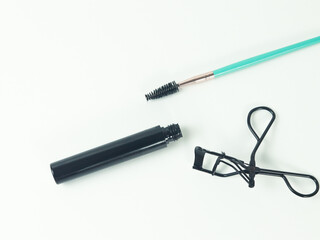 Mascara and eyes makeup tool on white background