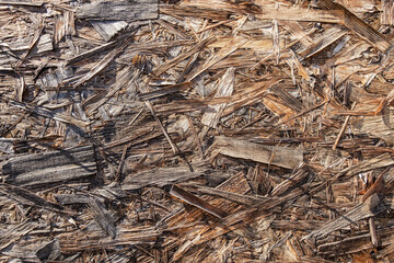 Background of a brown wooden sawdust panel