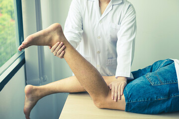 Male patients consulted physiotherapists with knee pain problems for examination and treatment. Rehabilitation physiotherapy concept