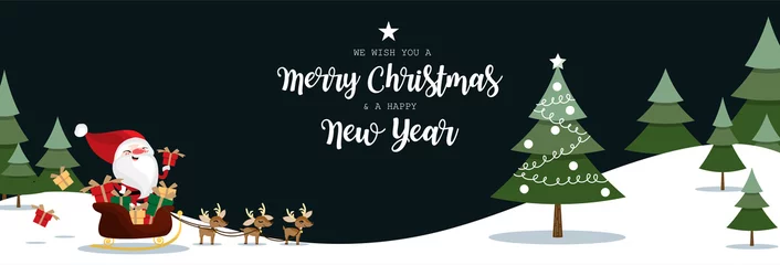 Fotobehang Santa Claus hold gift box on sleigh with a herd of reindeers and Christmas tree in pine tree forest on snow hill and dark sky with we wish you a Merry Christmas and a Happy New Year text. © NiiNew