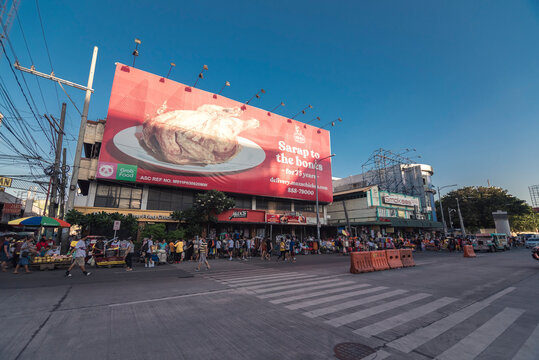 Paranaque, Metro Manila, Philippines - Nov 2021: A huge Max's billboard near Baclaran church