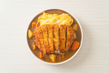 curry rice with fried pork cutlet and creamy omelet