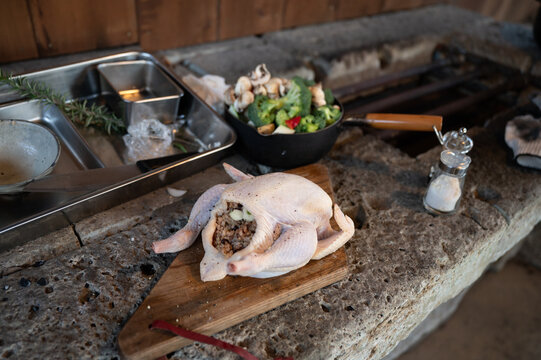 How to make roasted whole chicken in a Dutch oven for camping and glamping.
