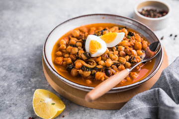 Potaje de vigilia - Chickpea stew with spinach and cod. Typical spanish food for Easter holidays.