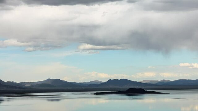 Time Lapse of the clouds moving above the salt water Mono Lake in California.