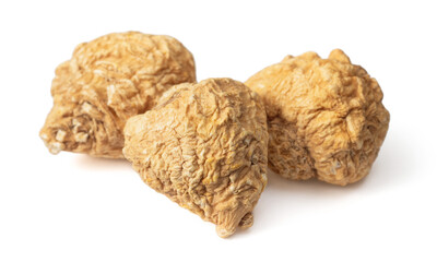 Dried yellow Maca roots isolated on white background
