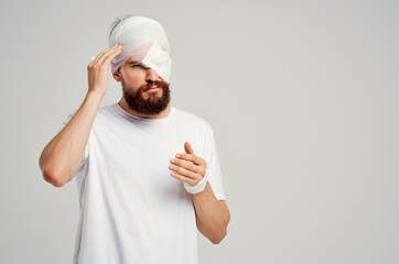sick man head injury in white t-shirt headache hospital medicine